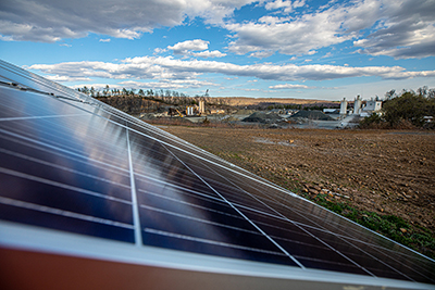 Panel with Asphalt Concrete Plant in Background